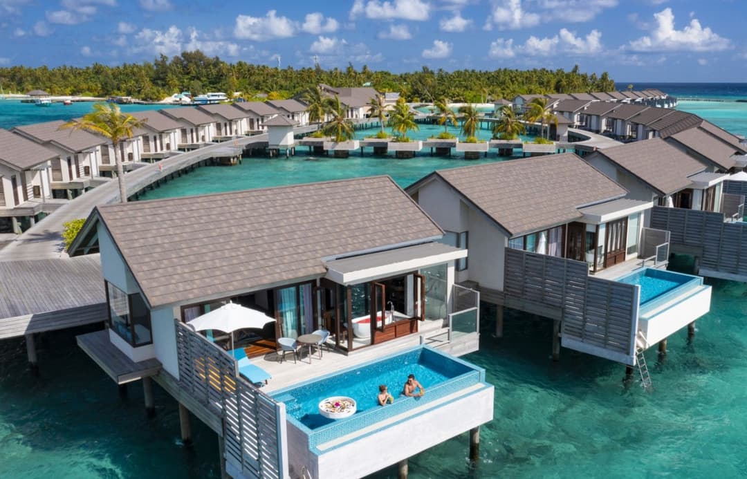 Atmosphere Kanifushi Escape: 2 Nights in a Sunset Beach Villa & 2 Nights in a Water Villa